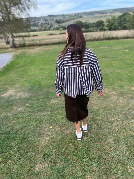 standing burgundy blouse