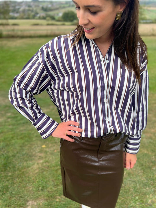 standing burgundy blouse